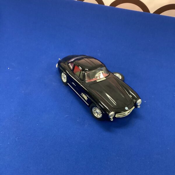 Detailed Burago Mercedes Benz SL300 model car for collectors.