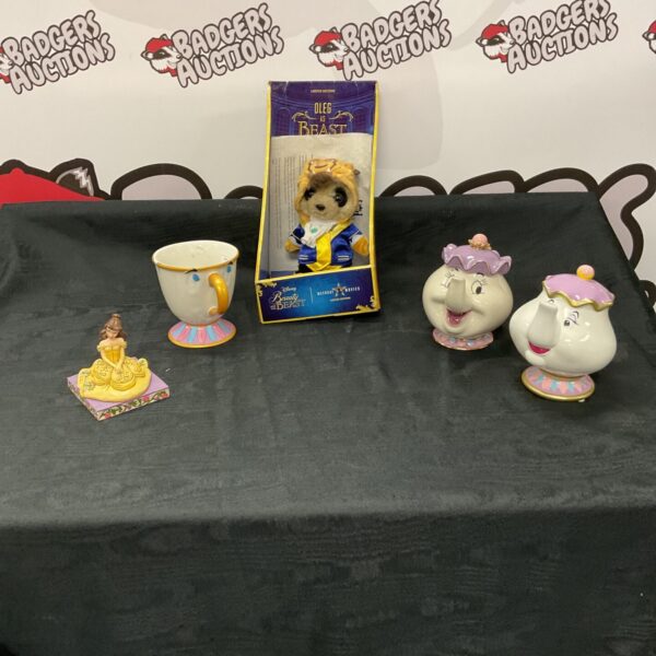 Disney Beauty and the Beast collectibles lot featuring plush and moneybox.