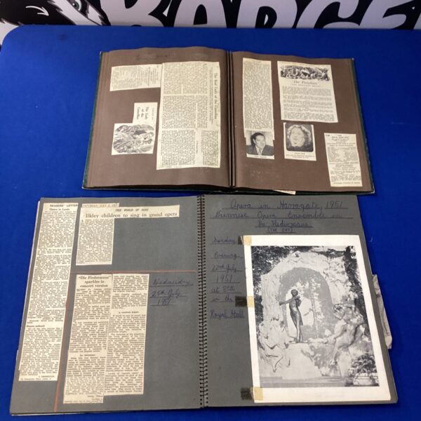 Two scrap books with vintage opera news cuttings