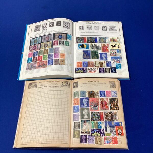 Open vintage stamp albums displaying a world stamp collection.