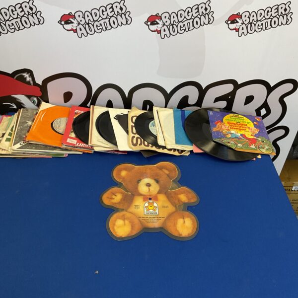 Selection of mixed 7” vinyl records including special edition teddy bear picture disc