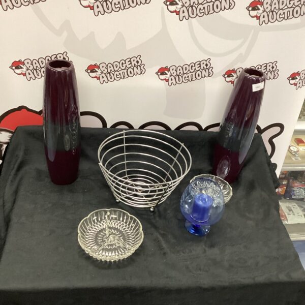 Vintage home decor lot featuring vases, basket, and dishes.