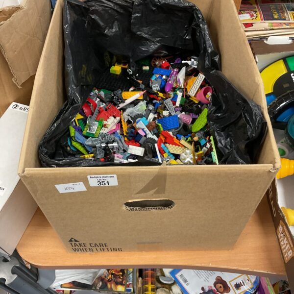 Large bulk lot of colourful Lego bricks and building blocks.