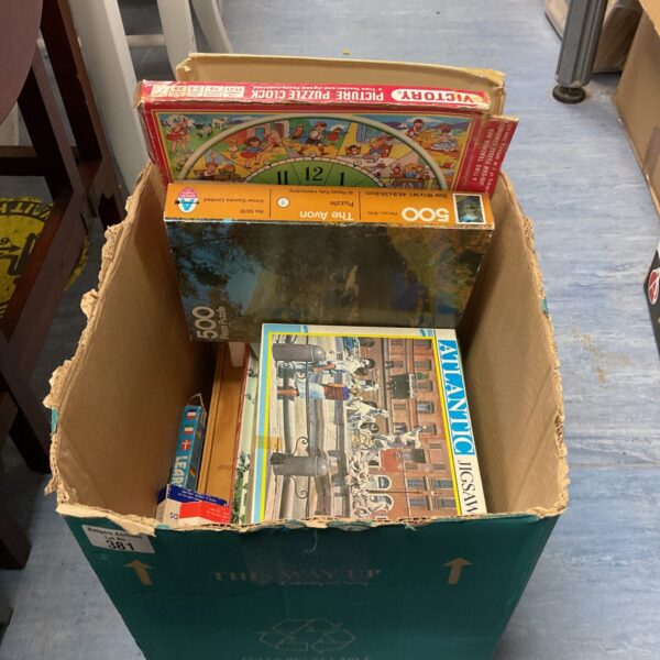 Colourful vintage puzzle box with illustrations.