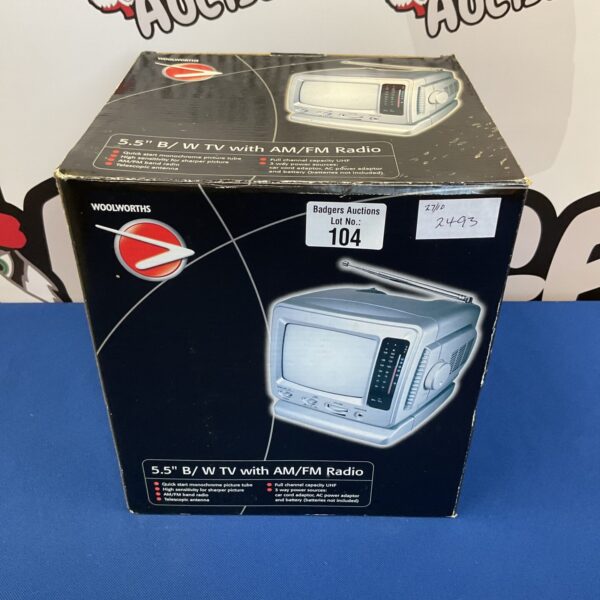Vintage Woolworths portable TV radio with telescopic aerials.