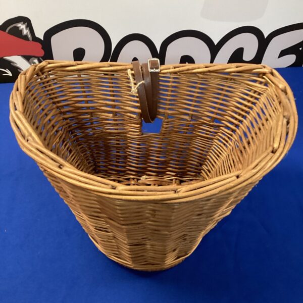 Vintage bicycle wicker basket, front view, classic cycling accessory.