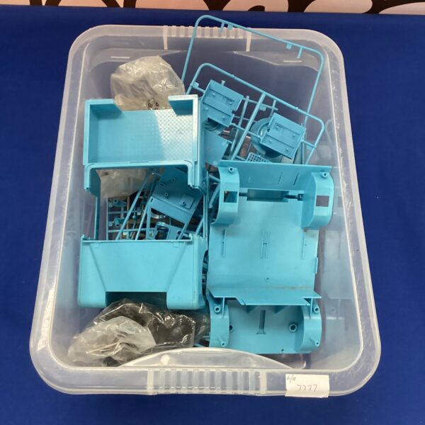 Disassembled Wallace and Gromit Land Rover model kit for collectors.