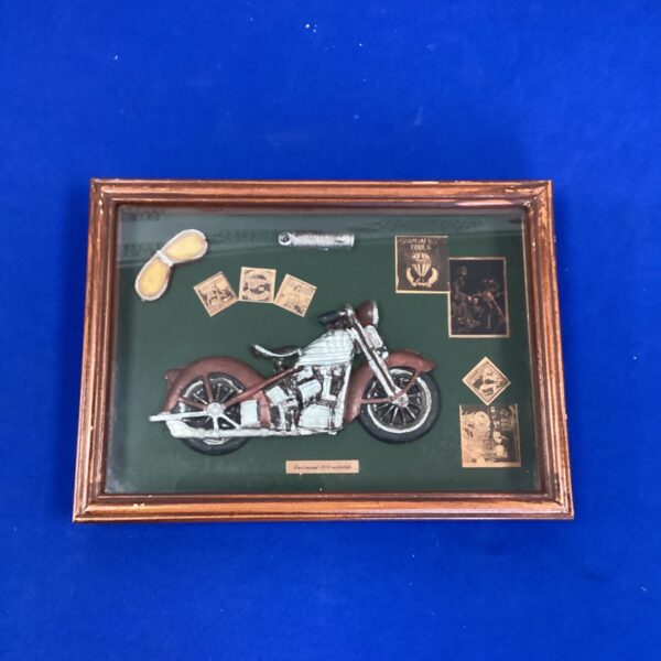 Intricate steampunk motorcycle art made from watch parts.