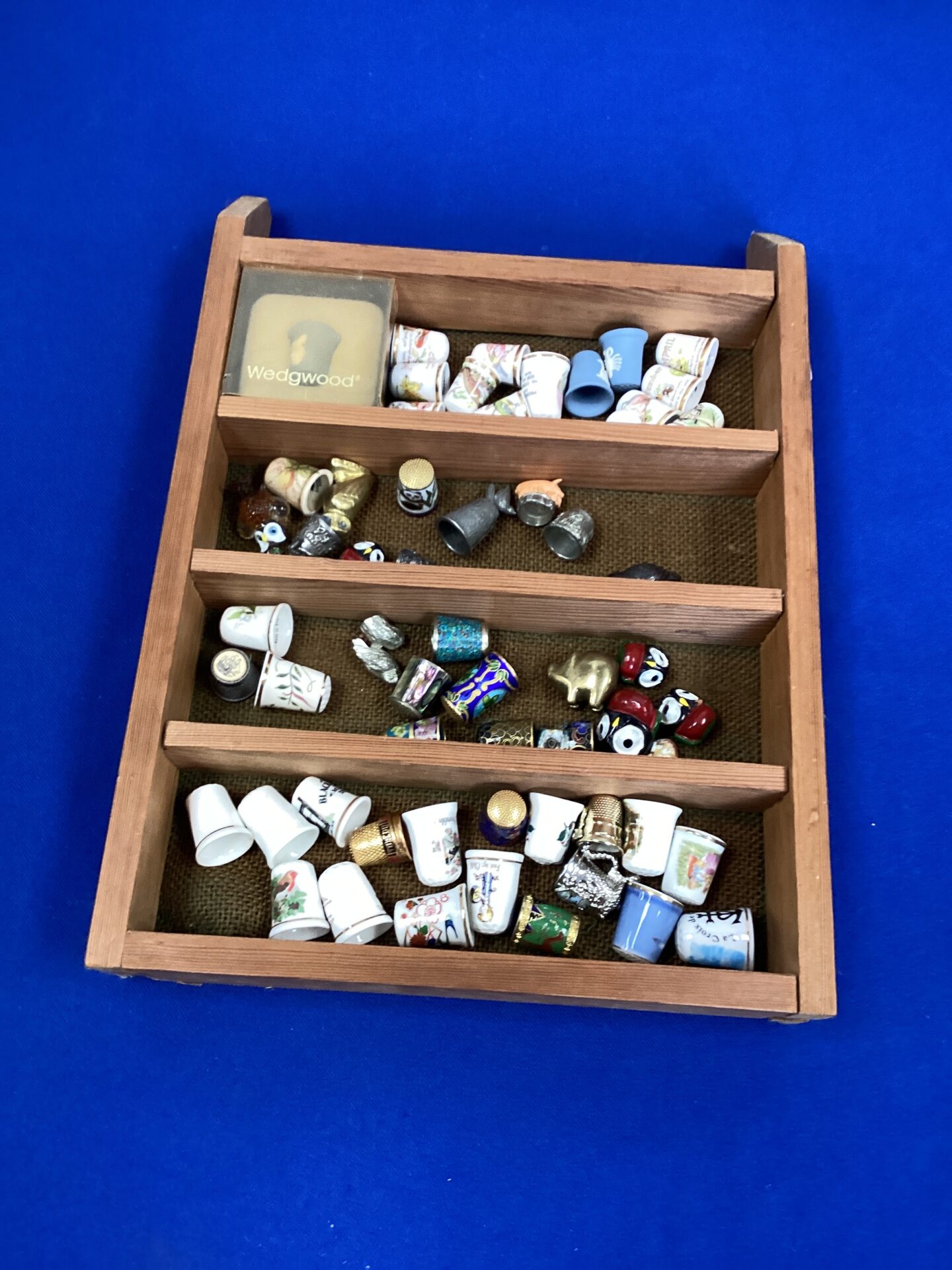 262 Quantity of thimbles with display case
