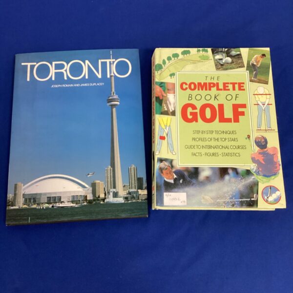 Vintage lot of Toronto and golf books, collectible hardbacks.