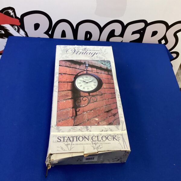 Vintage Four Seasons outdoor clock with Roman numerals for garden decor.