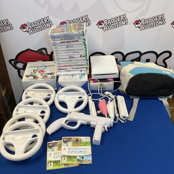 Nintendo Wii console with a large collection of games and accessories.