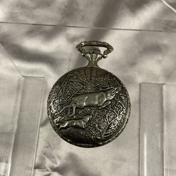 Detailed Anker pocket watch with stag and dog hunting scene.