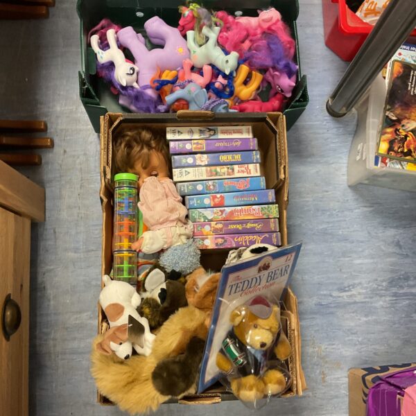 Overview of a mixed toy lot including My Little Pony and teddy bears.