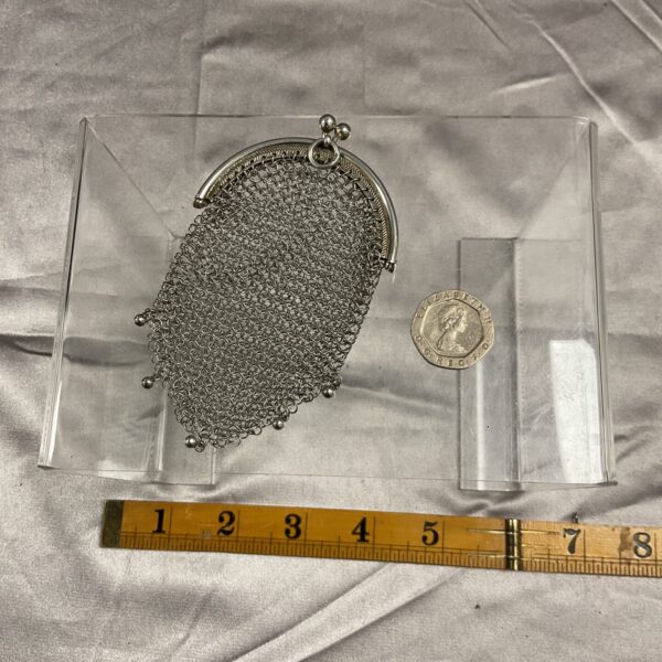 Vintage silver chainmail purse with delicate mesh design.