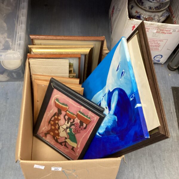 Mixed artwork lot featuring framed prints and paintings.