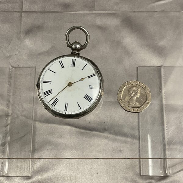Antique silver G&C Geneve pocket watch with white dial.
