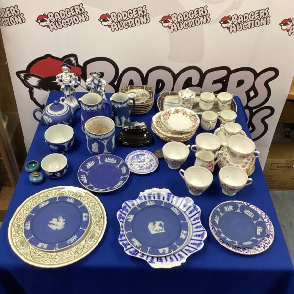 Blue Wedgwood Jasperware pottery collection on display.