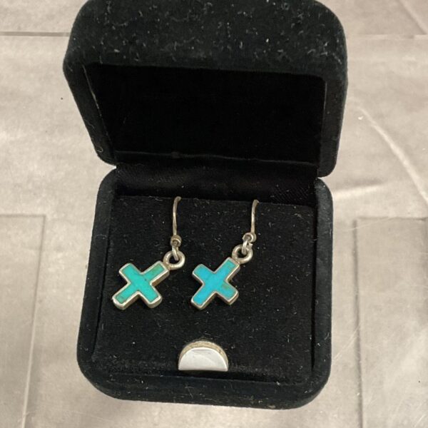 Turquoise enamel cross earrings displayed in a presentation box.