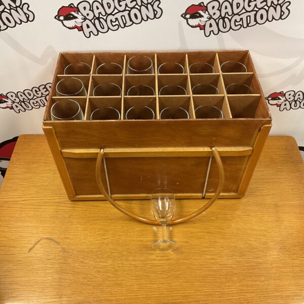 Vintage wooden two-tier wine glass transit case with glasses inside.