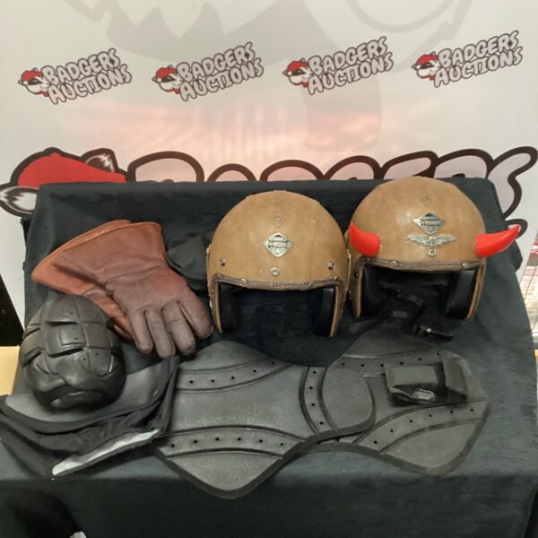Vintage Harley Davidson style helmets and leather gloves for collectors.