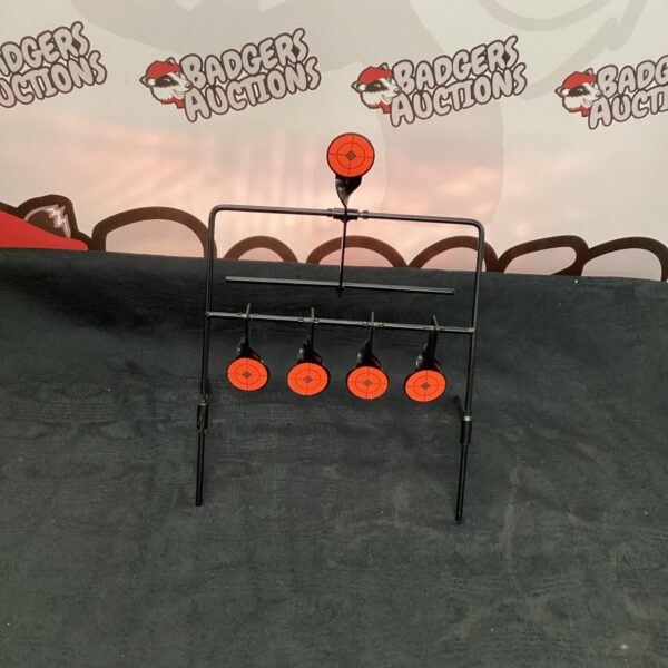 Vintage metal pistol target gallery for shooting practice.