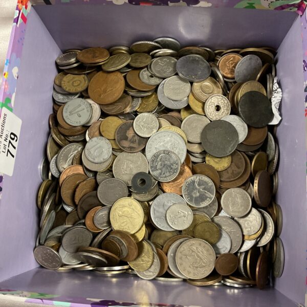 Assorted coins in a box, a mixed coin lot for collectors.