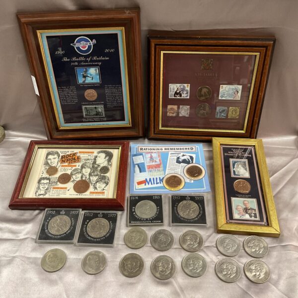 Framed and loose commemorative British coins collection for collectors.