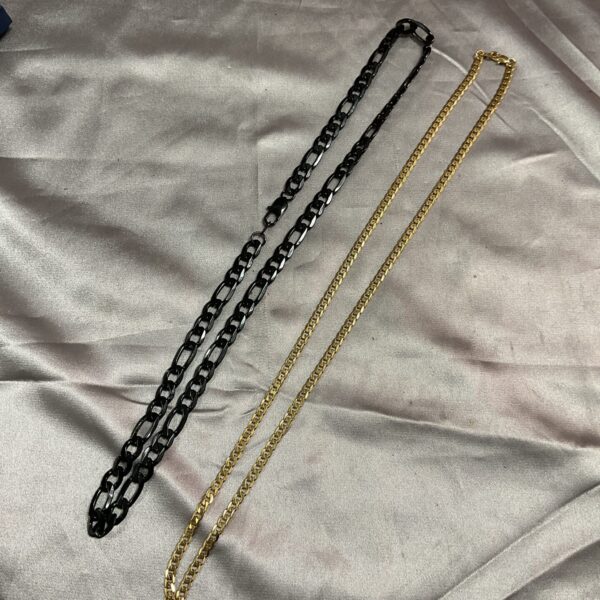 Long 24 inch silver necklace with linked chain design.