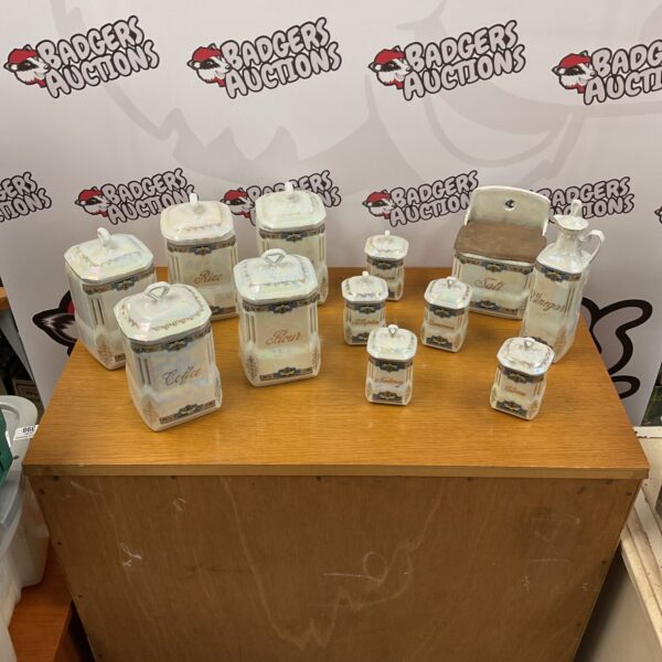 Vintage Czech Slovakian spice jars set on a table.