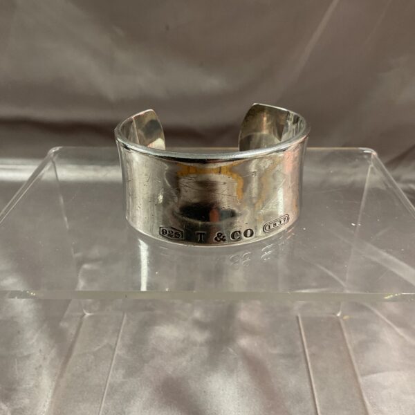 Vintage Tiffany and Co silver bracelet, wide band cuff design.