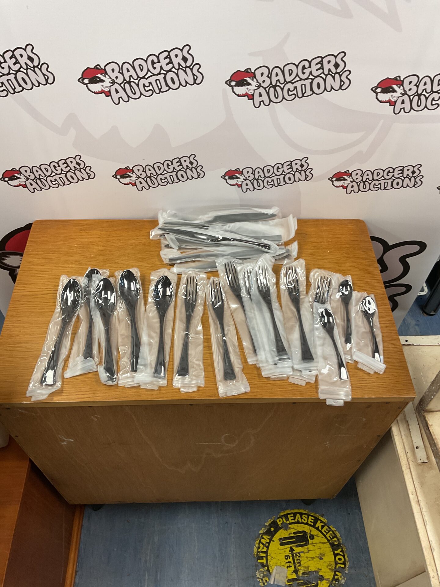 439 Box of black style cutlery