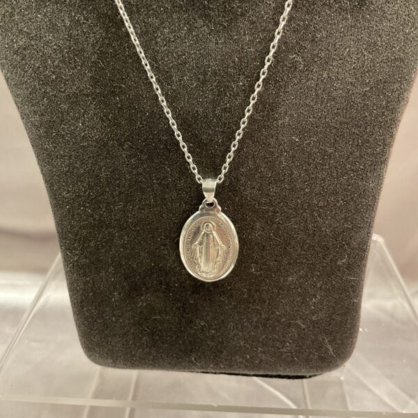 Silver St Christopher pendant necklace on a chain.
