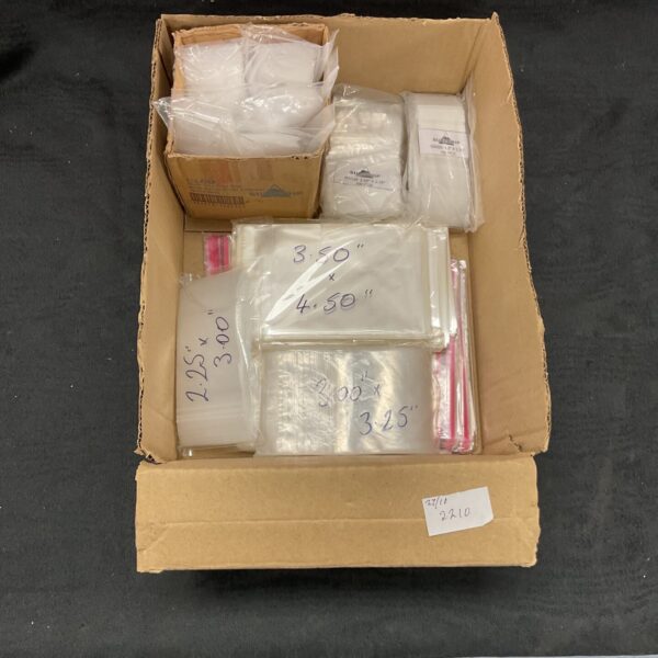 Mixed lot of clear zip seal bags for storage and food preservation.