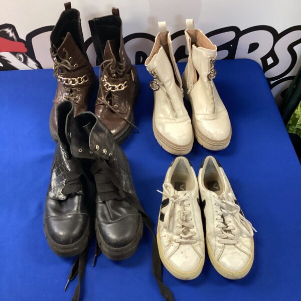 Black ankle boots in a mixed boots lot.