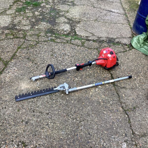 Long reach Mountfield petrol hedge trimmer for garden maintenance.