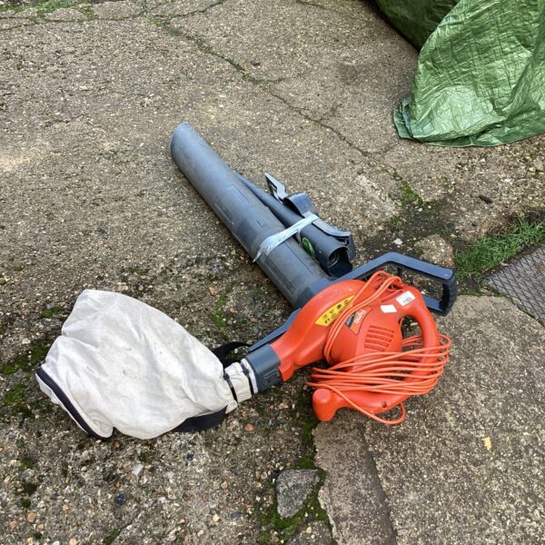 Used Flymo electric leaf blower and garden vacuum for garden maintenance.