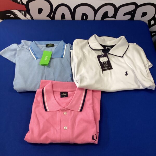Bundle of new Ralph Lauren, Fred Perry, and Hugo Boss polo shirts.