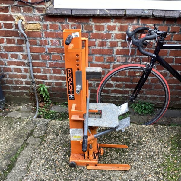 Orange Duocut log splitter for wood splitting and garden use.