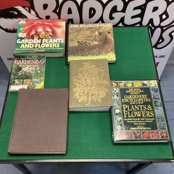 Collection of vintage gardening books including RHS guides.