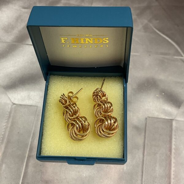 Classic 9ct gold hoop earrings with a twisted rope design.