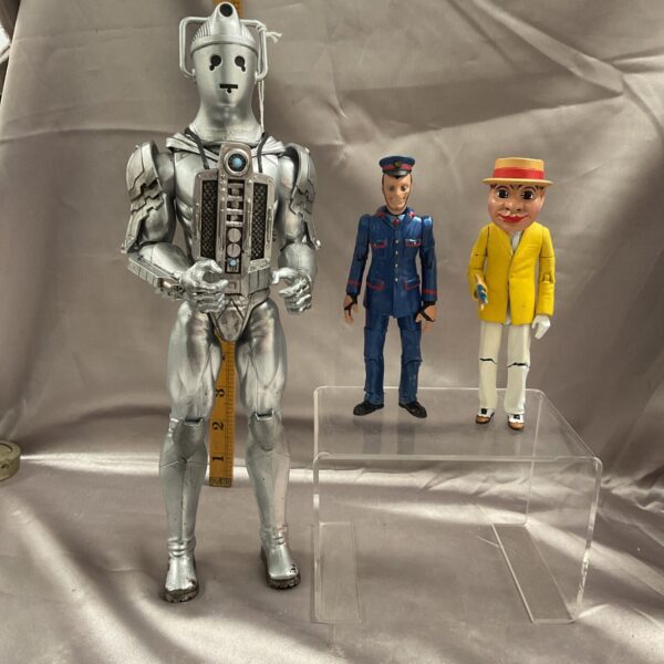 Vintage Dr Who figures featuring a Cyberman and two Autons.