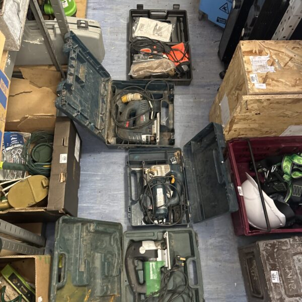 Assorted power tool lot including Hitachi, Bosch, and Challenge brands.