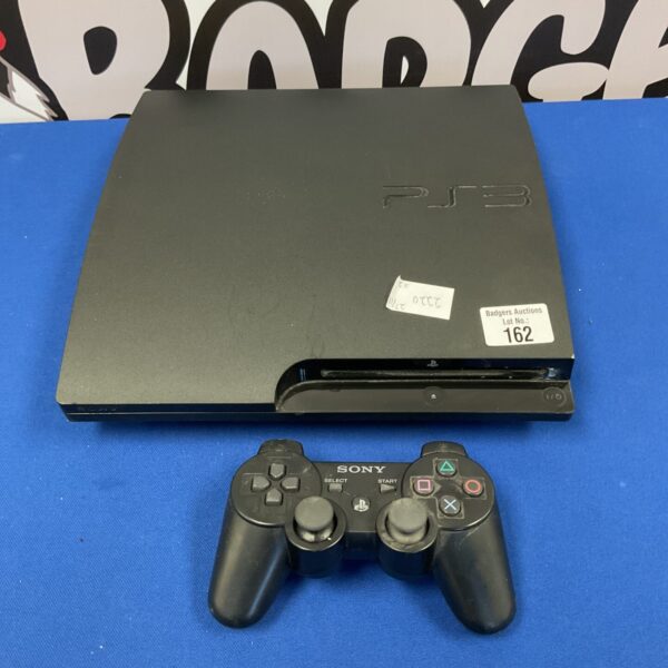 Black PlayStation 3 console with controller for retro gaming.