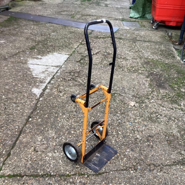 Steel folding sack barrow for moving and transporting loads.