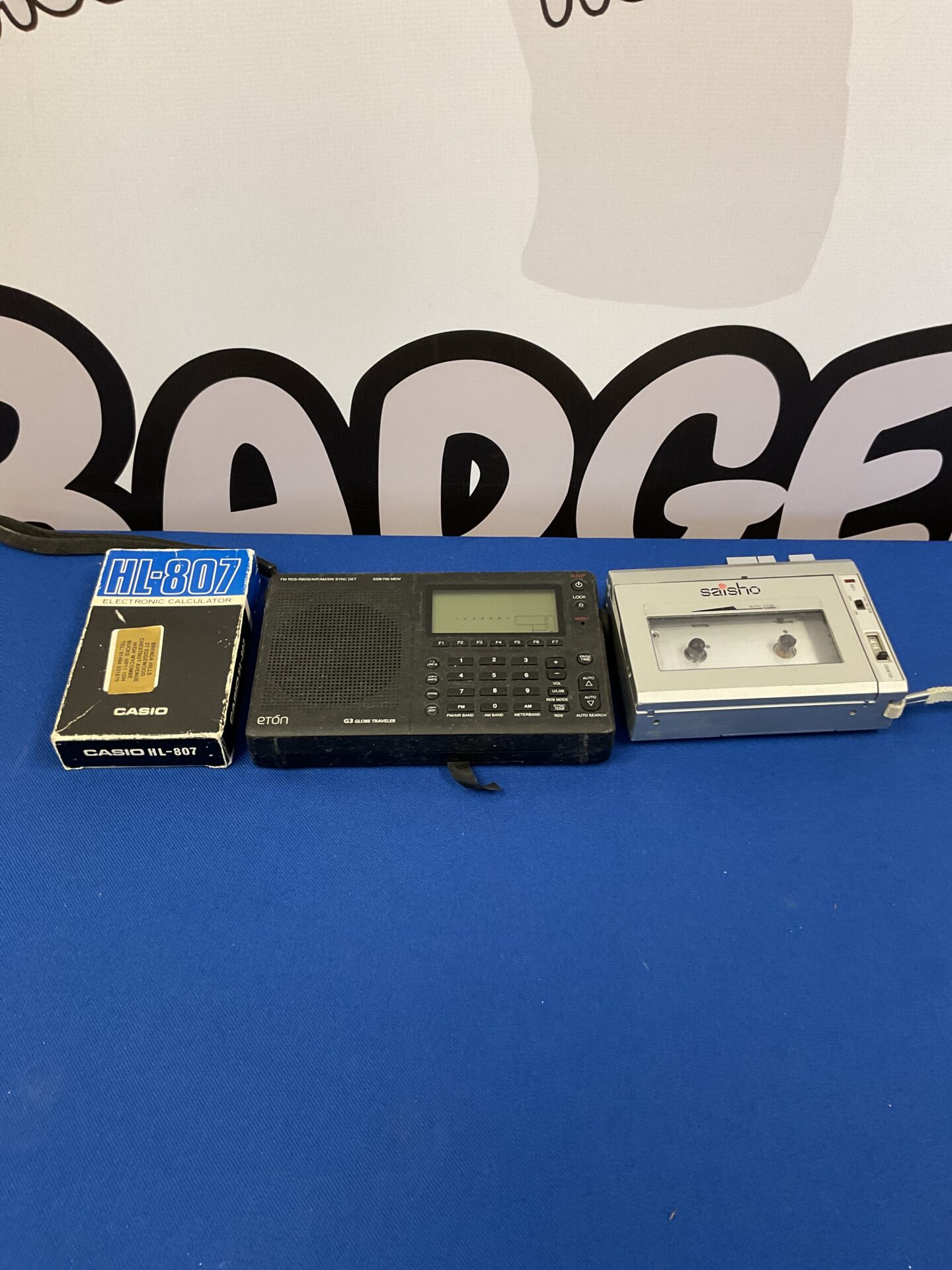 166 Eton G3 Globe Traveller digital radio, Saisho TR35 Walkman and Casio HL-807 calculator