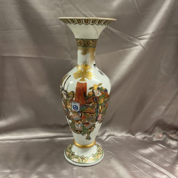 Antique Japanese porcelain vase with detailed hand-painted scenes.