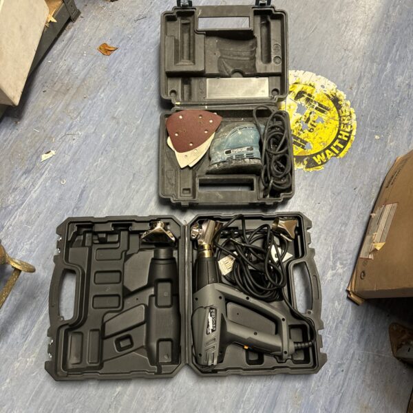 Erbauer nibbler and Titan heat gun kit in a carrying case.
