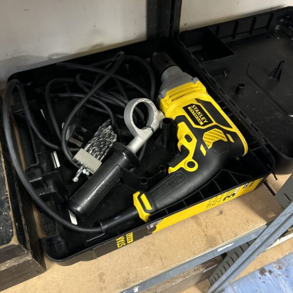Stanley Fatmax drill with included drill bits, a powerful DIY tool.