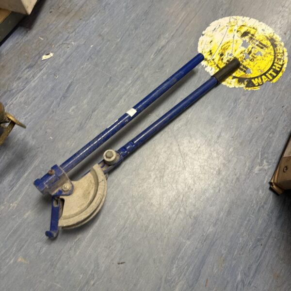 Blue manual pipe bending tool for 22mm piping.